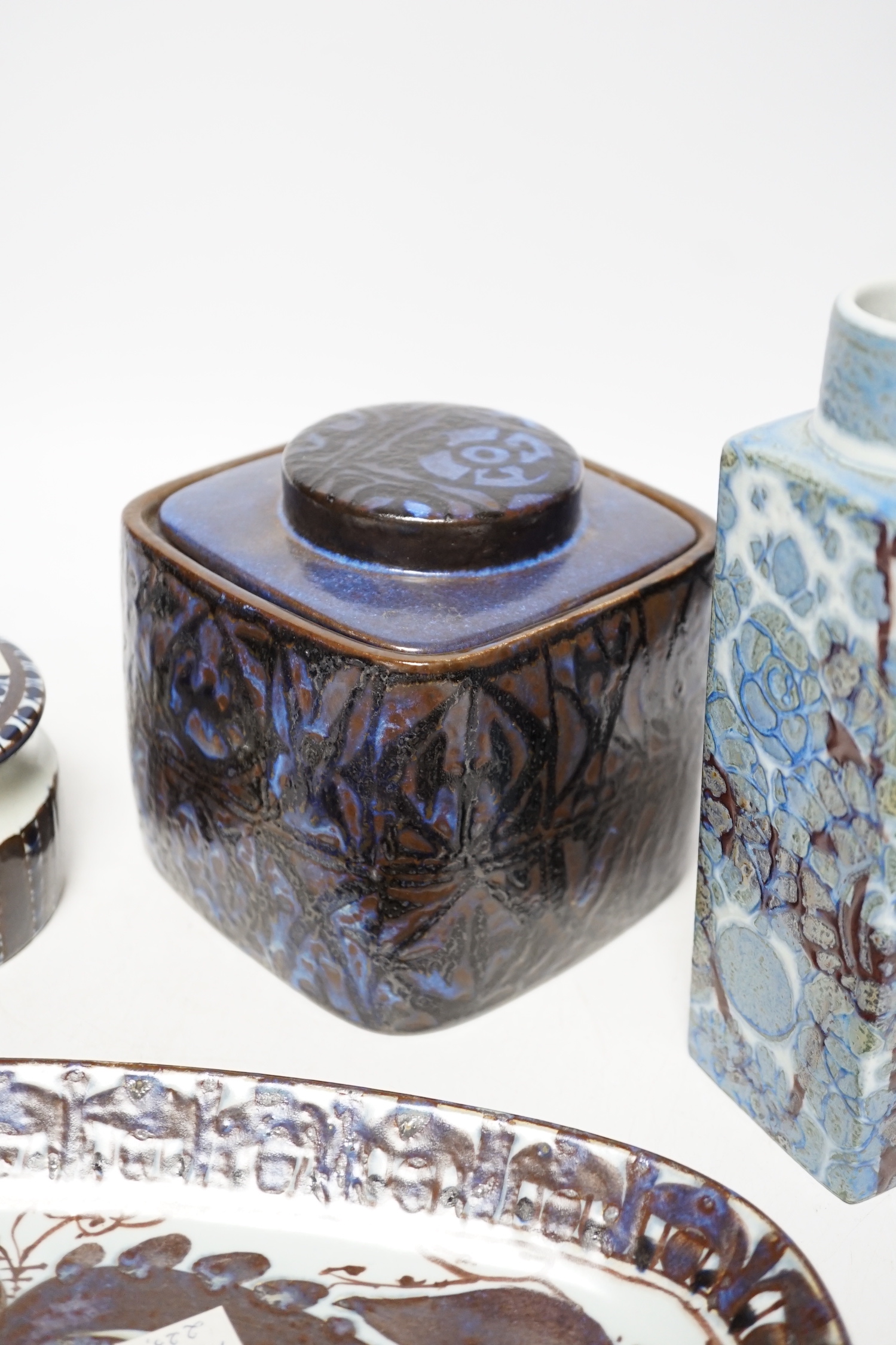 A pair of Royal Copenhagen pottery ‘fajance’ blue glaze vases and a squat jar and cover, together with an Alumina ware larger jar and cover and a rectangular tray signed CK, tallest 19cm